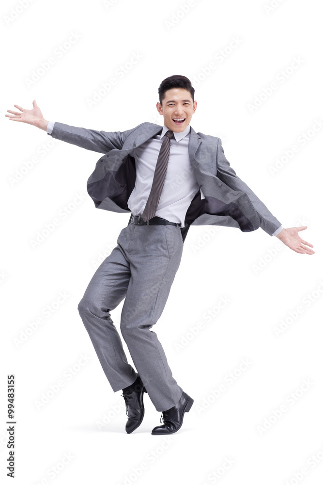 Excited businessman jumping