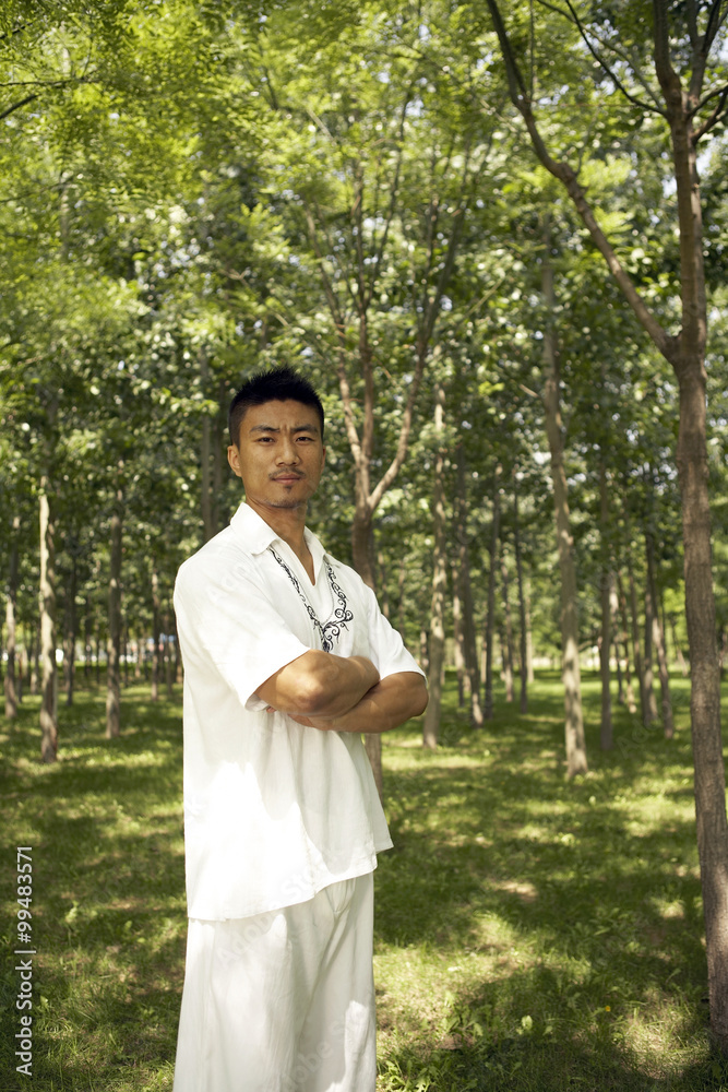 Man Meditating In Park