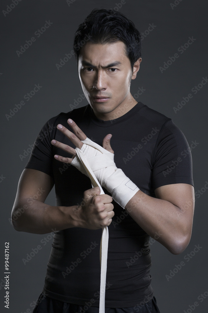 Boxer wrapping hands