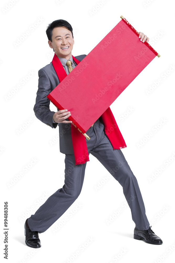 Happy businessman with blank scroll