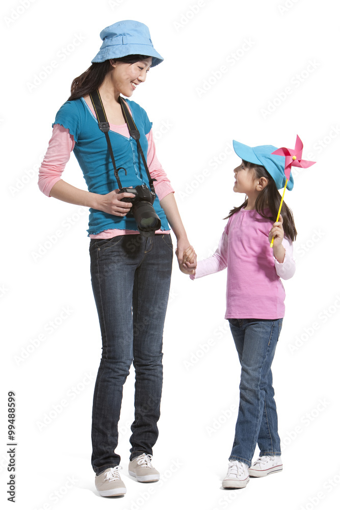 Portrait of mother and daughter travelling