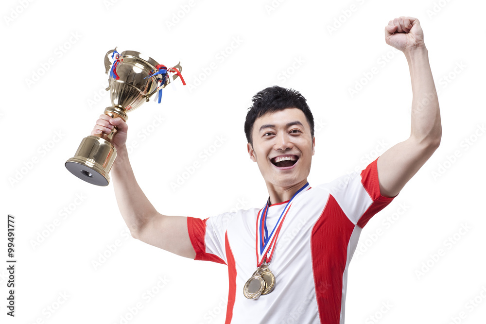 Athlete with trophy and medal