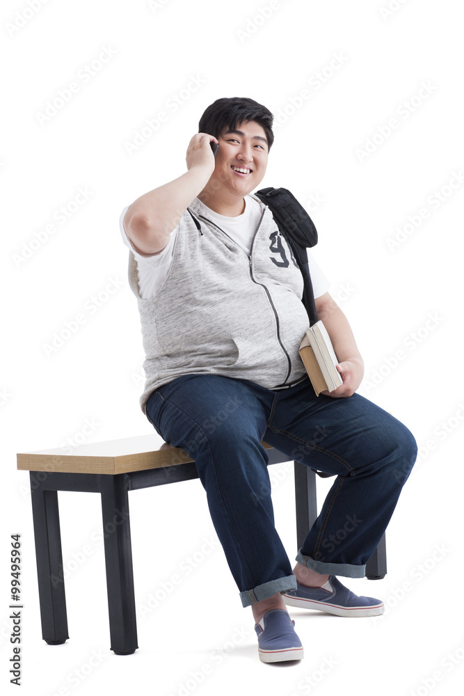 Young college student on the phone