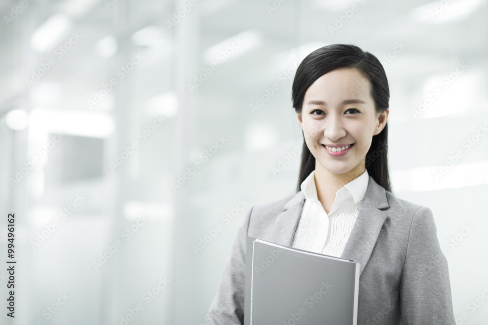 Happy young businesswoman