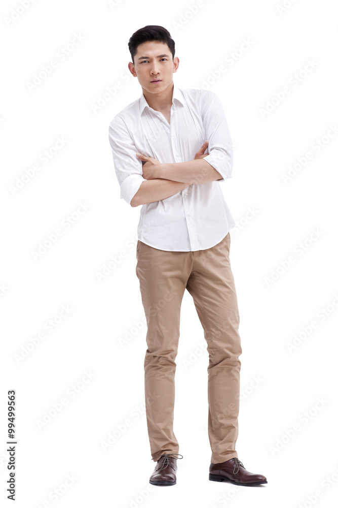 Cool young man with arms crossed