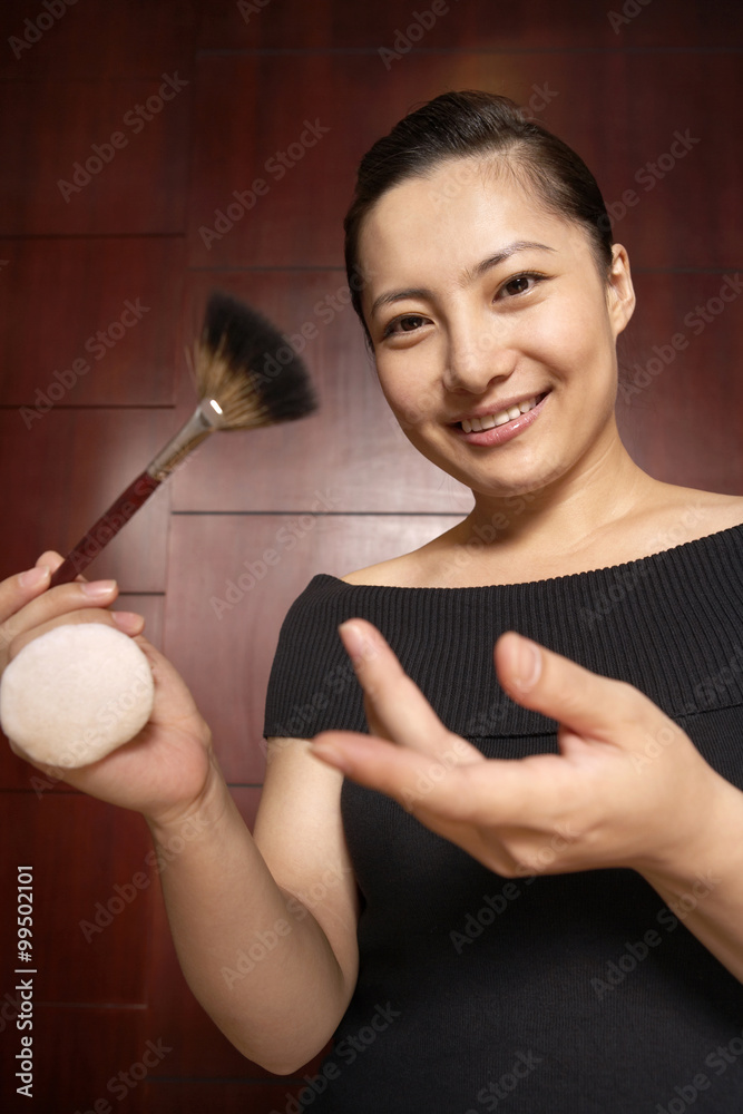 Make-Up Artist Holding Make-Up