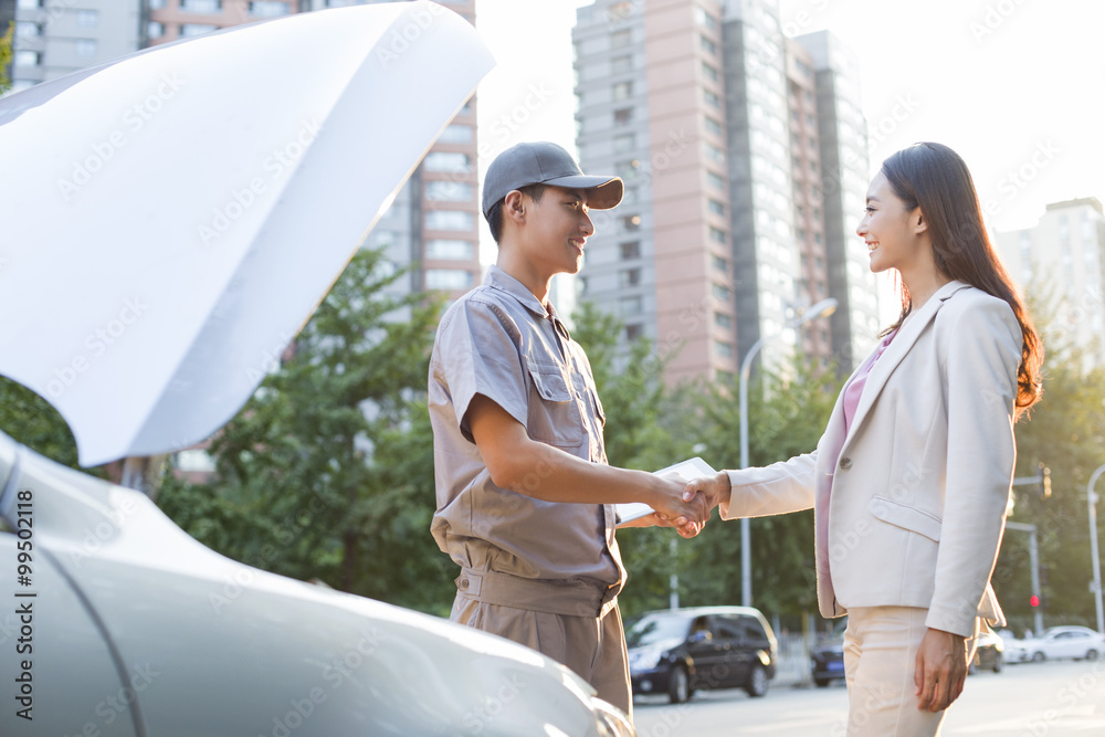 Auto mechanic and car owner