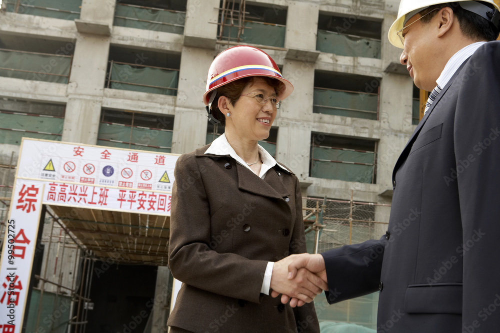 Construction Contractors Shaking Hands