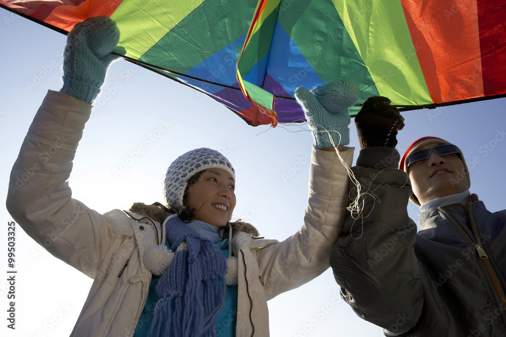 Young Couple On The Great Wall Of China With A Kite