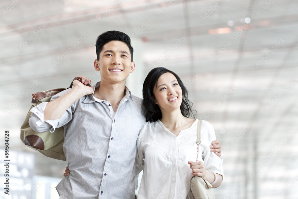 Young couple at the airport