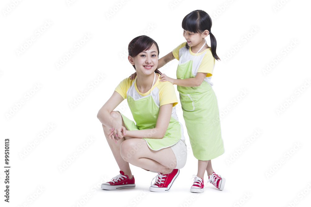 Daughter massaging mothers shoulders