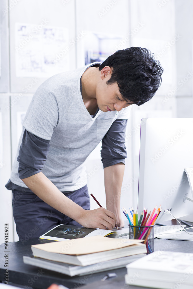 Young man working in the office