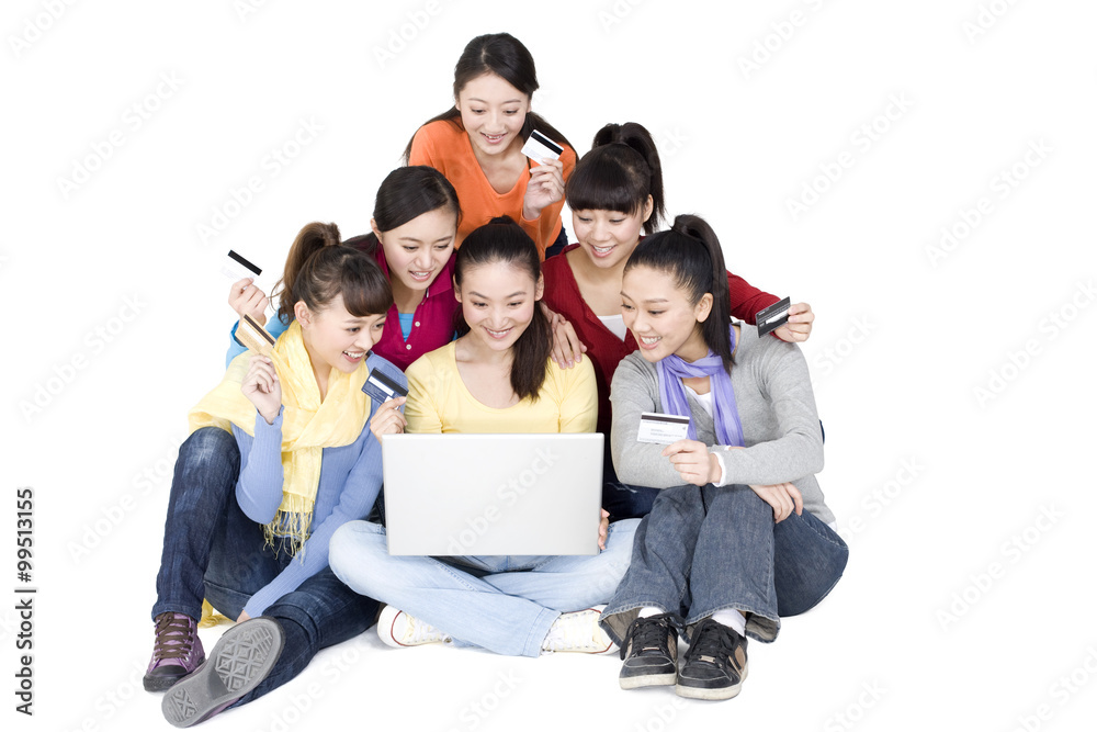 Young women shopping online