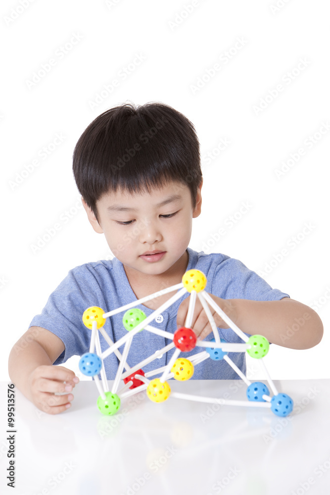 Boy playing universal ball