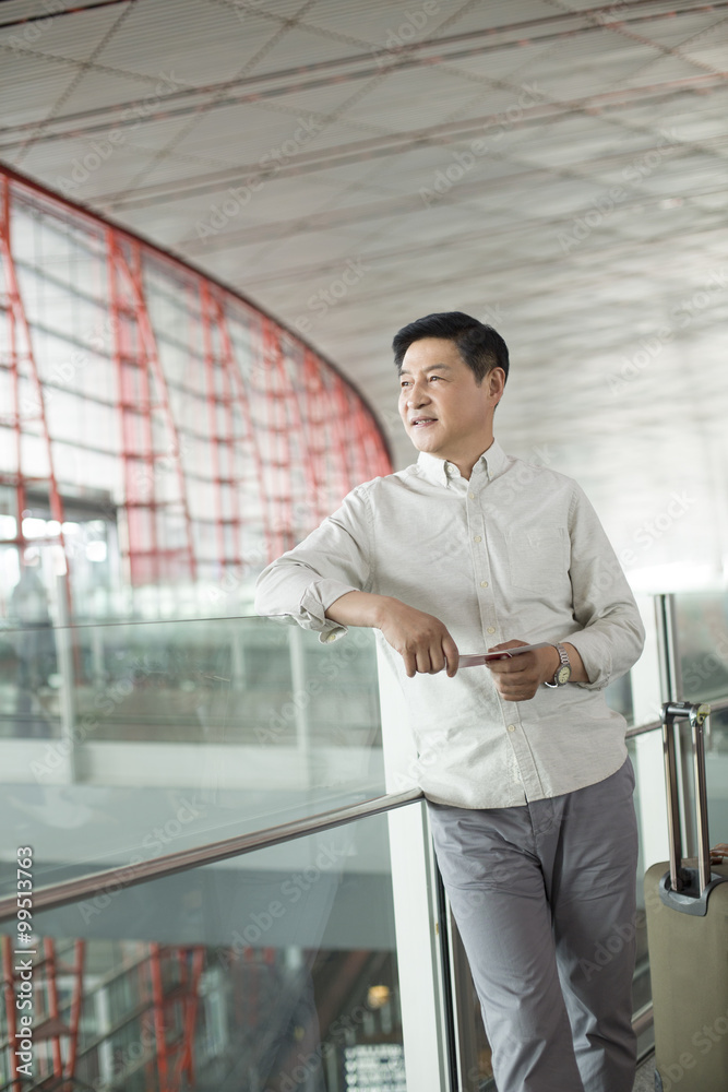 Mature man waiting at airport