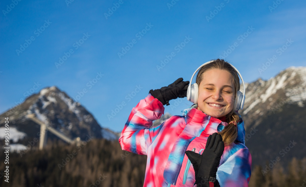 Happy beautiful girl in headphones