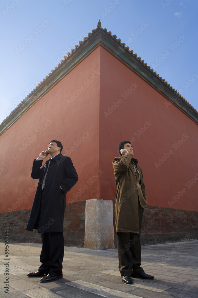 Businessmen Next To Building Exterior , 