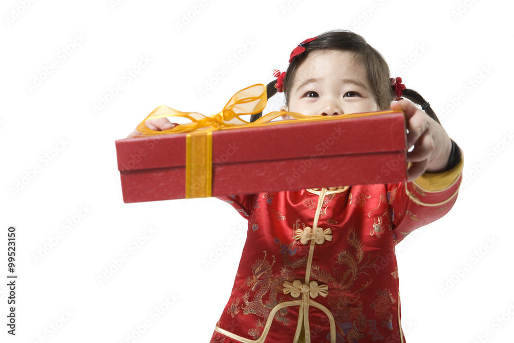 Young girl holding gift box