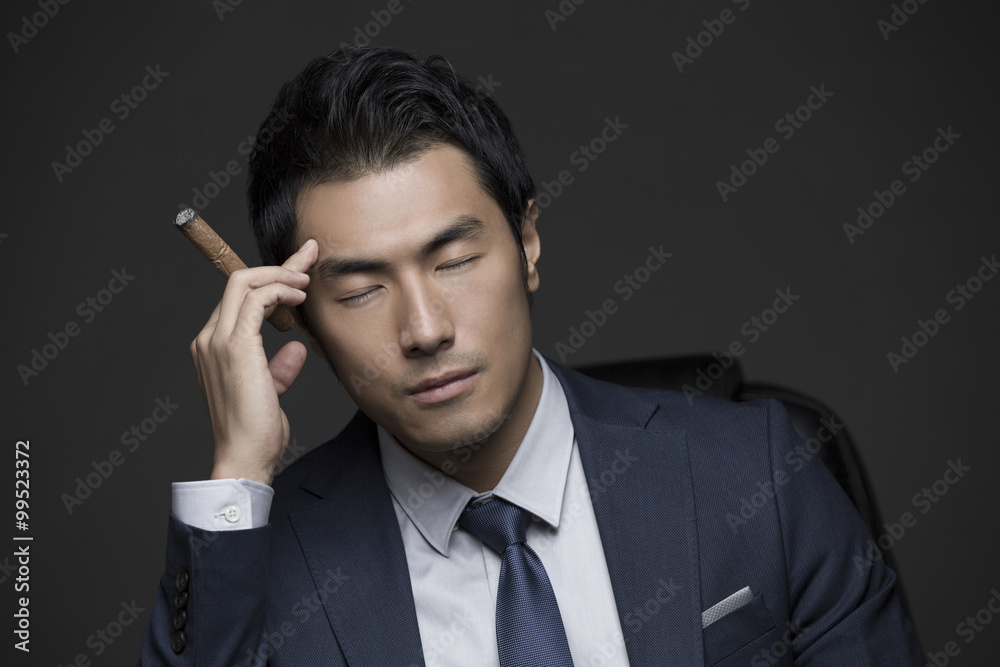 Businessman with cigar