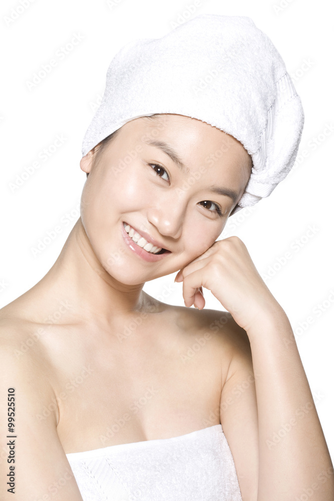 Beauty shot of a young woman in a towel