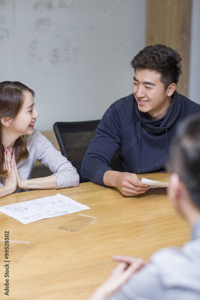 IT workers having a meeting in board room