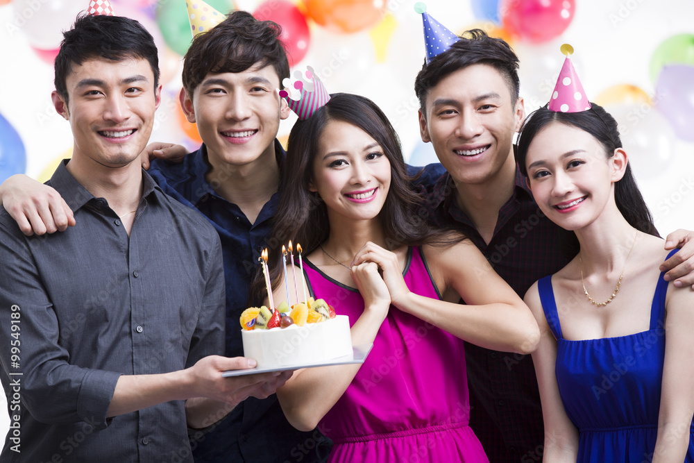 Young adults having a birthday party