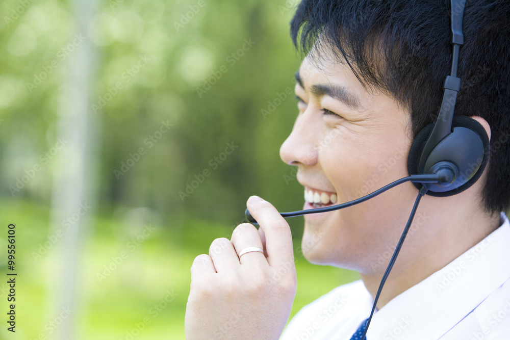 Asian man with headset