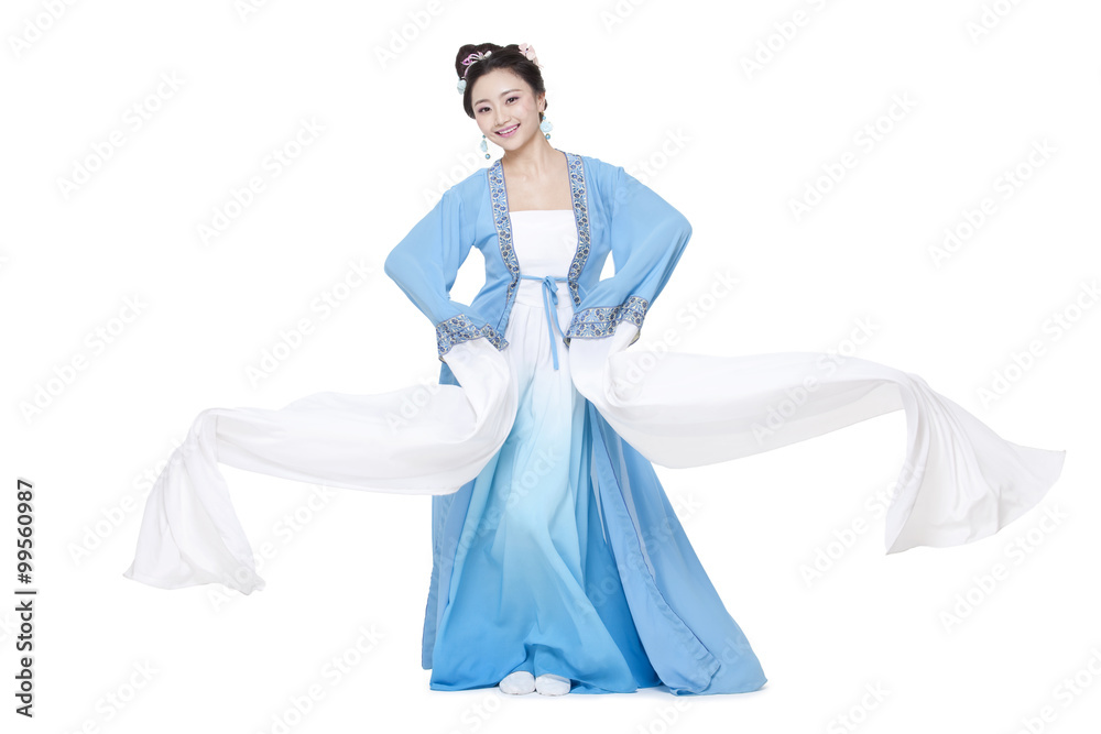 Young woman in Chinese traditional costume dancing