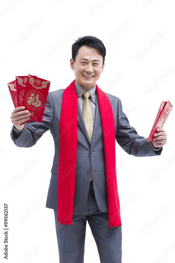 Happy business colleagues gifting traditional red envelopes