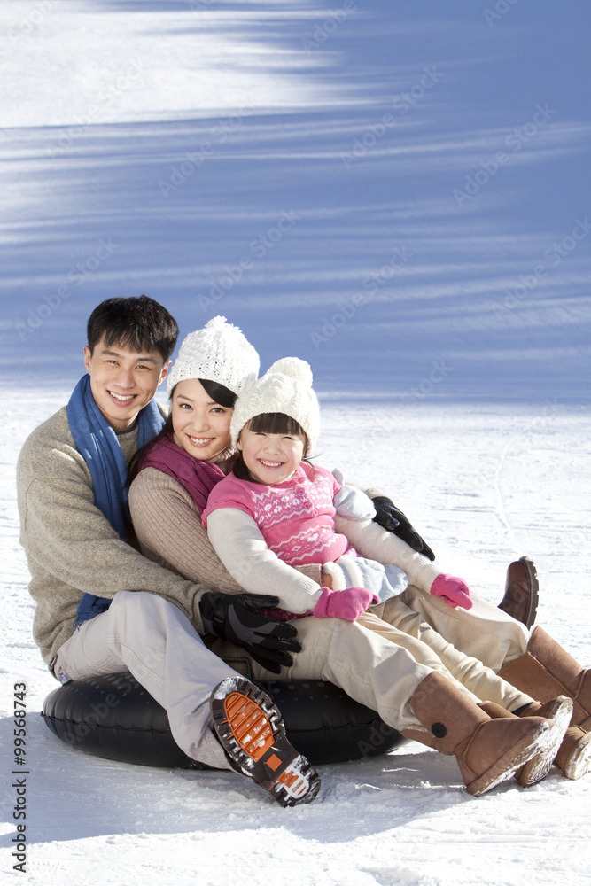 Family having fun in snow