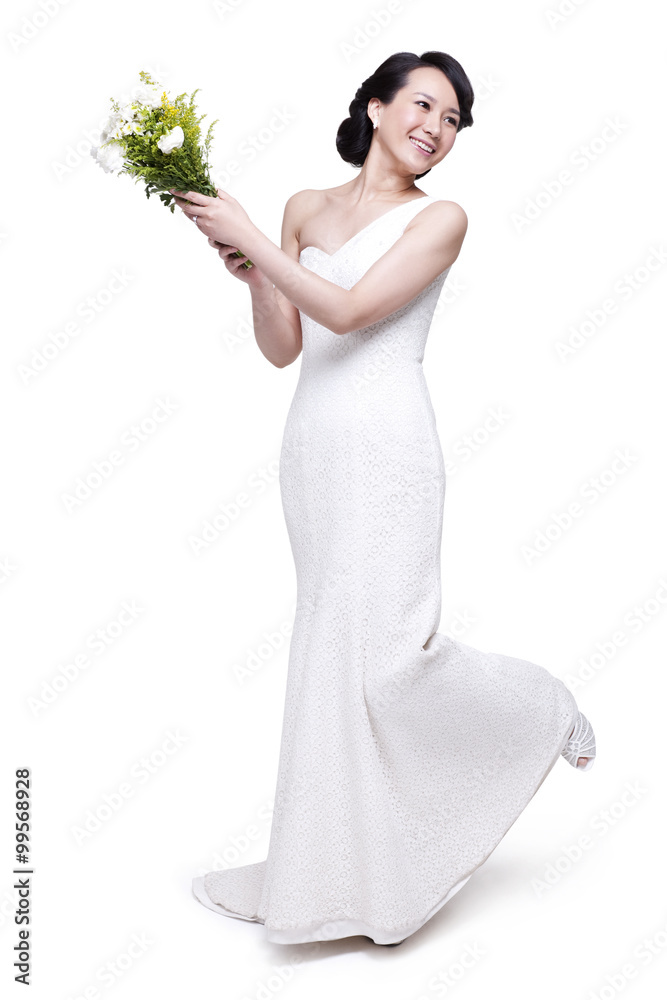 Beautiful young woman with bouquet