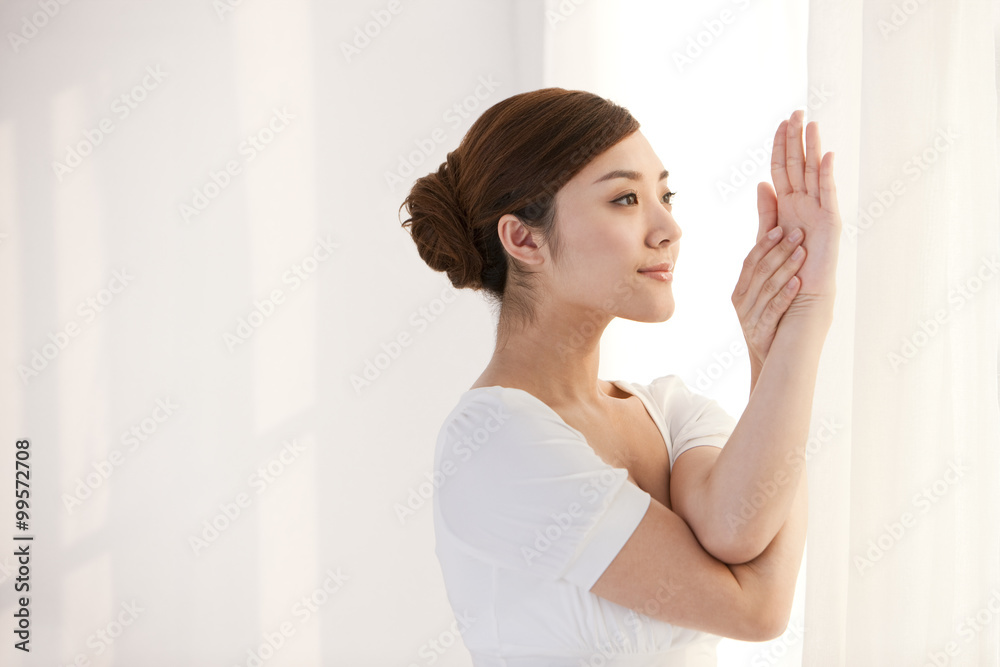 Young woman practicing yoga