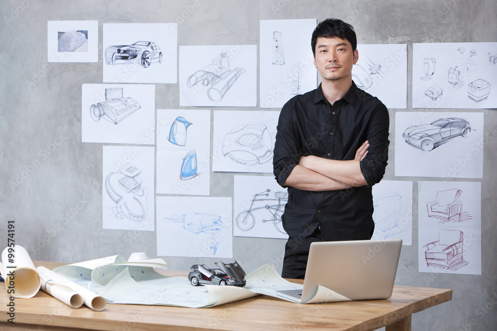 Portrait of car designer in studio