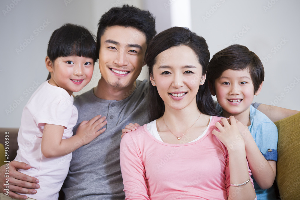 Happy family resting in sofa