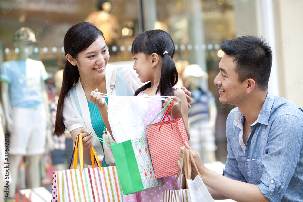 Family shopping in department store