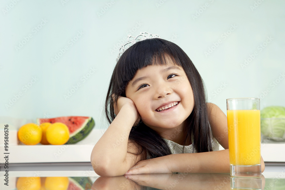 Girl Laughing With Glass Of Juice