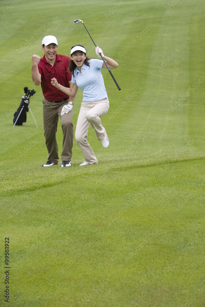 Two Golfers Celebrate a Great Shot