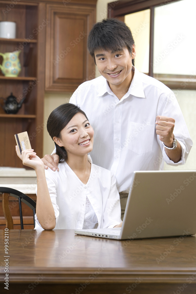 Young couple shopping online