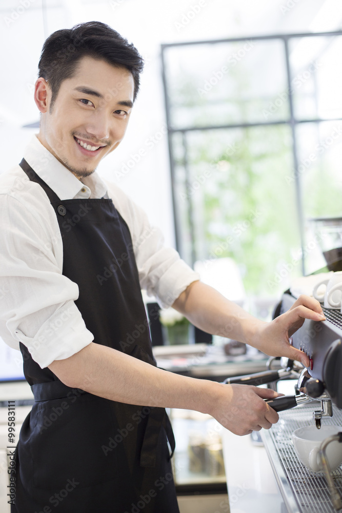 Barista making coffee