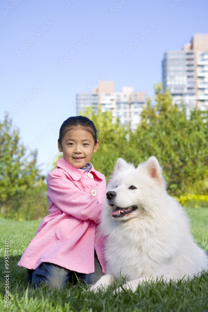 A young girl and her dog