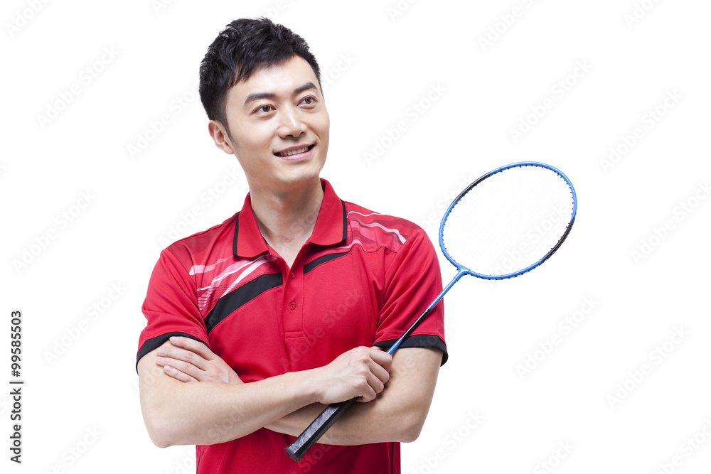 Portrait of male athlete with badminton racket