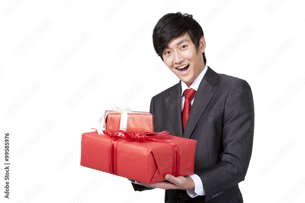 Excited Businessman Holding Gifts