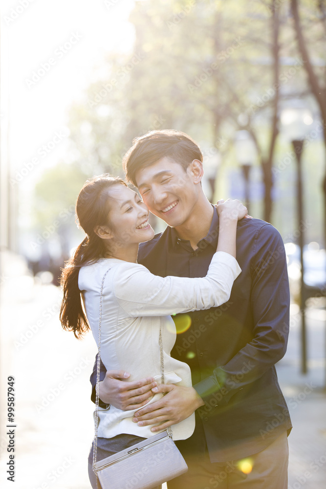 Happy young couple embracing