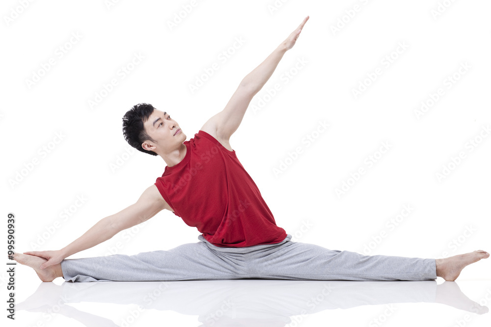 Young man doing yoga