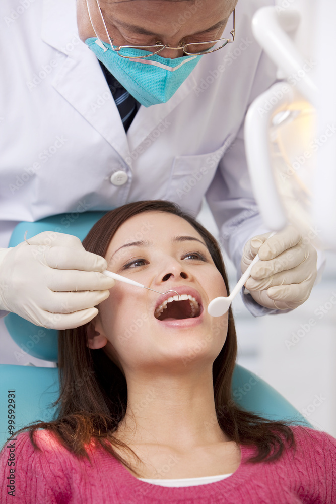 Patient receiving treatment in dental clinic