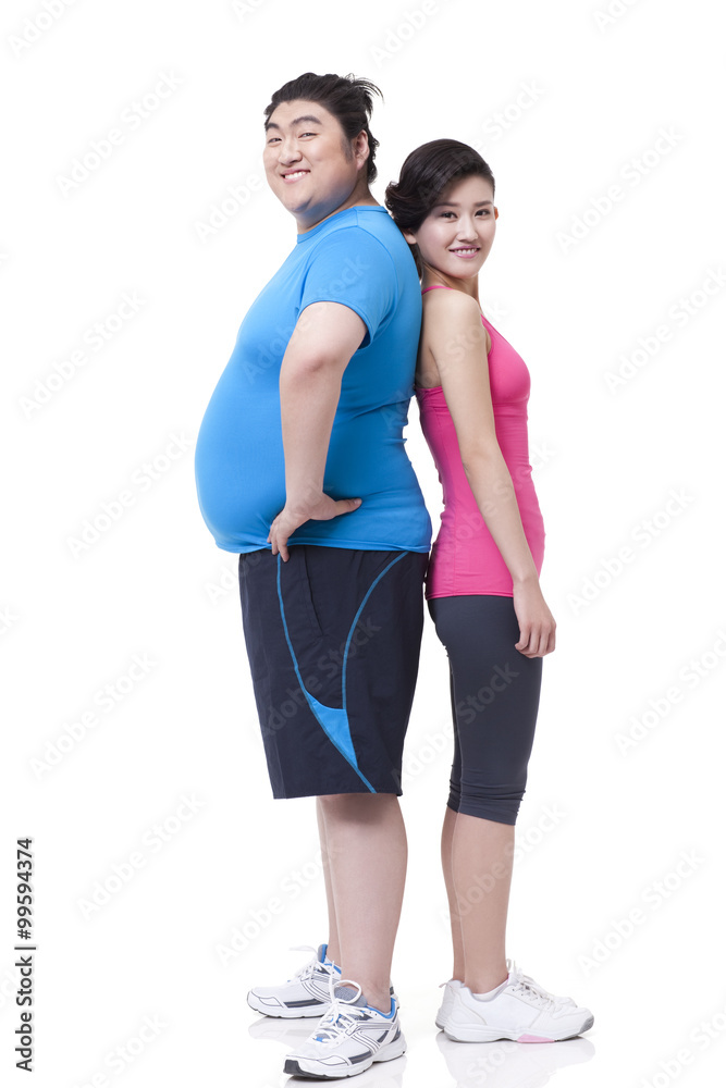 Happy Chubby man and young woman standing back to back