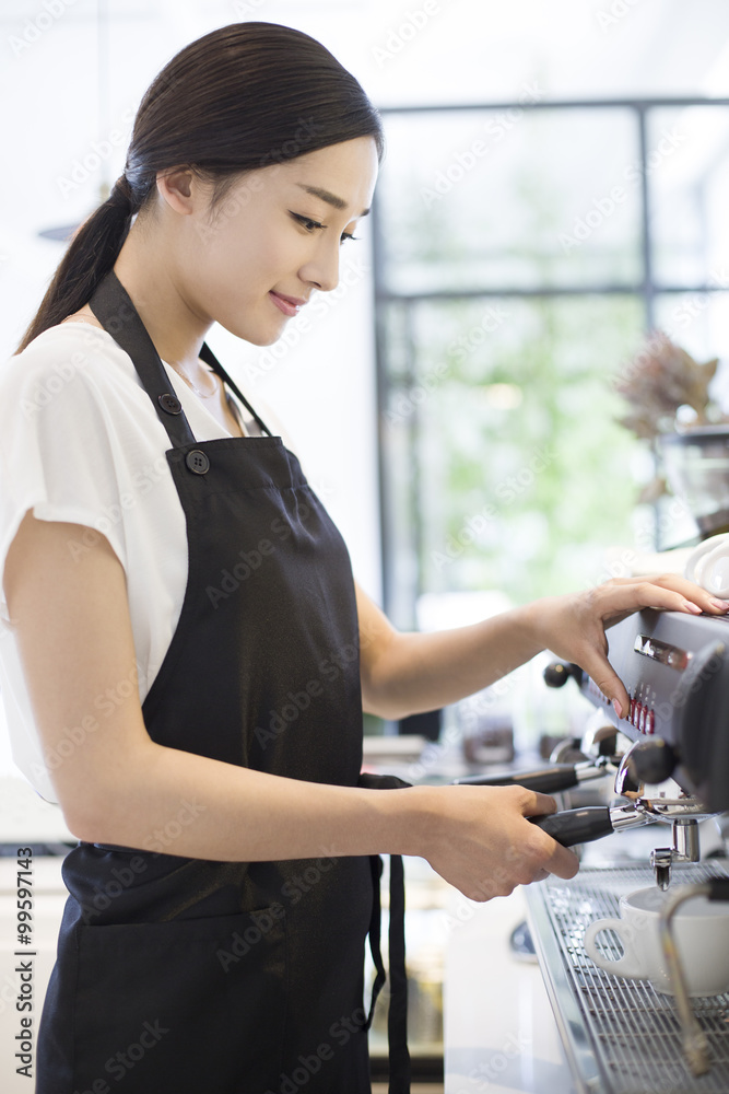 Barista making coffee