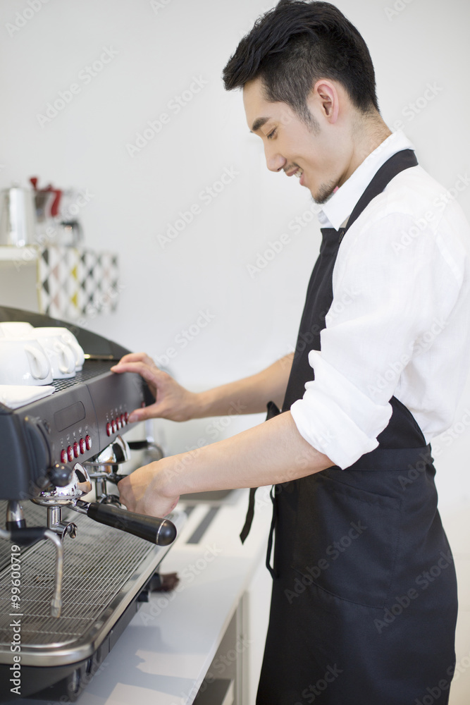 Barista making coffee