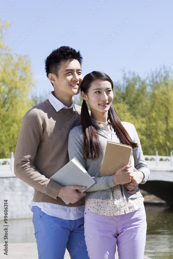 Cheerful young couple outdoors