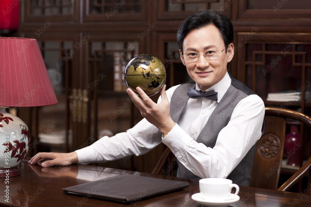 Businessman with a globe